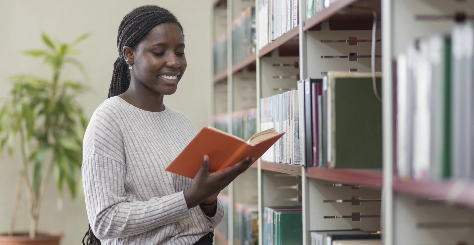 medium-shot-woman-reading-book